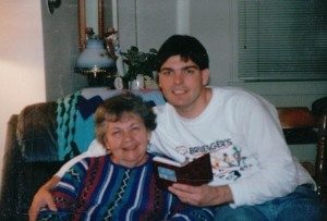 Mom & Me holding a picture book she made for me recalling all my life's special family memories!